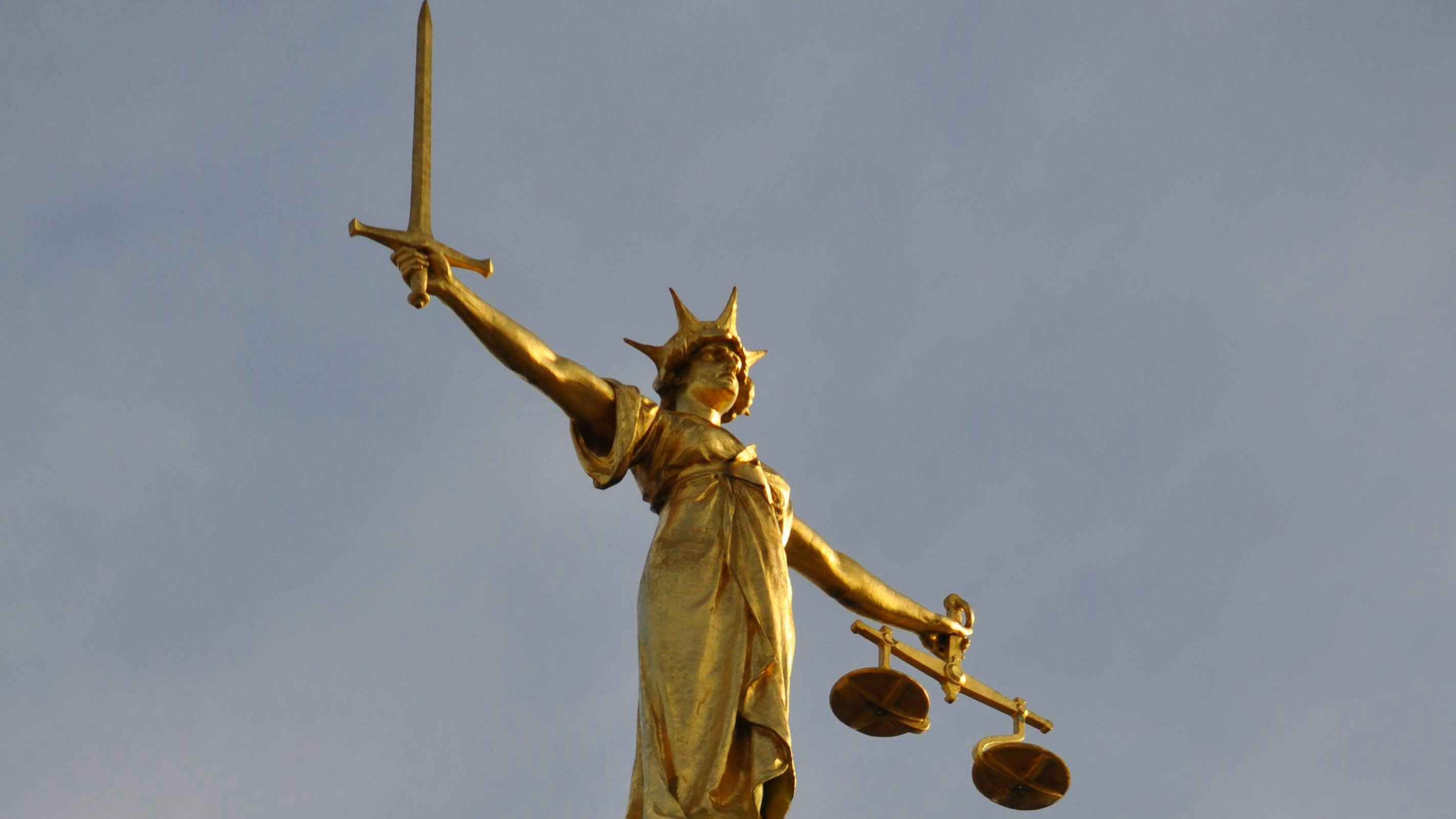 Gold statue of justice.